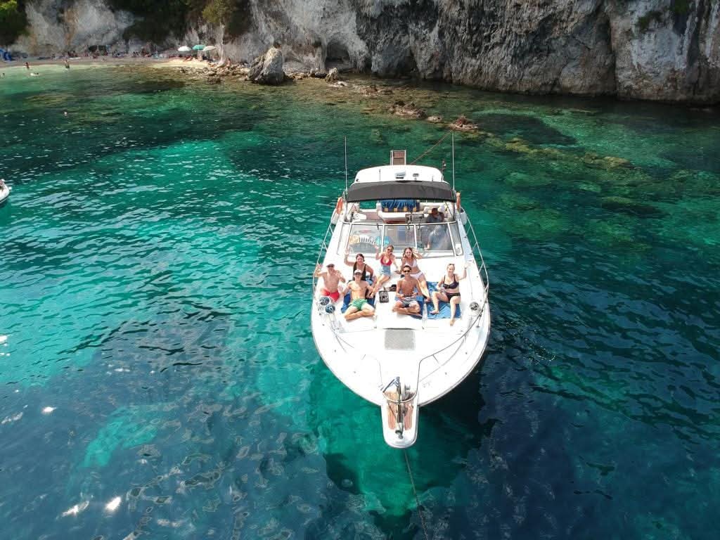 Yacht anchored in a clear turquoise bay