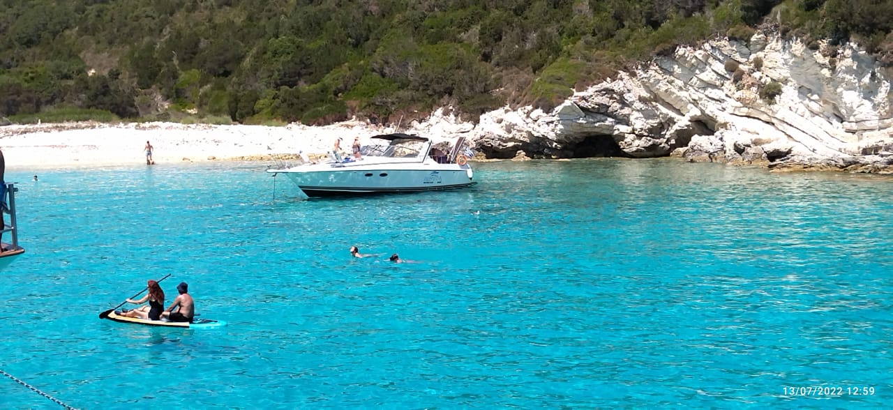 Almyra guests swimming in the turquoise water of Blue Lagoon