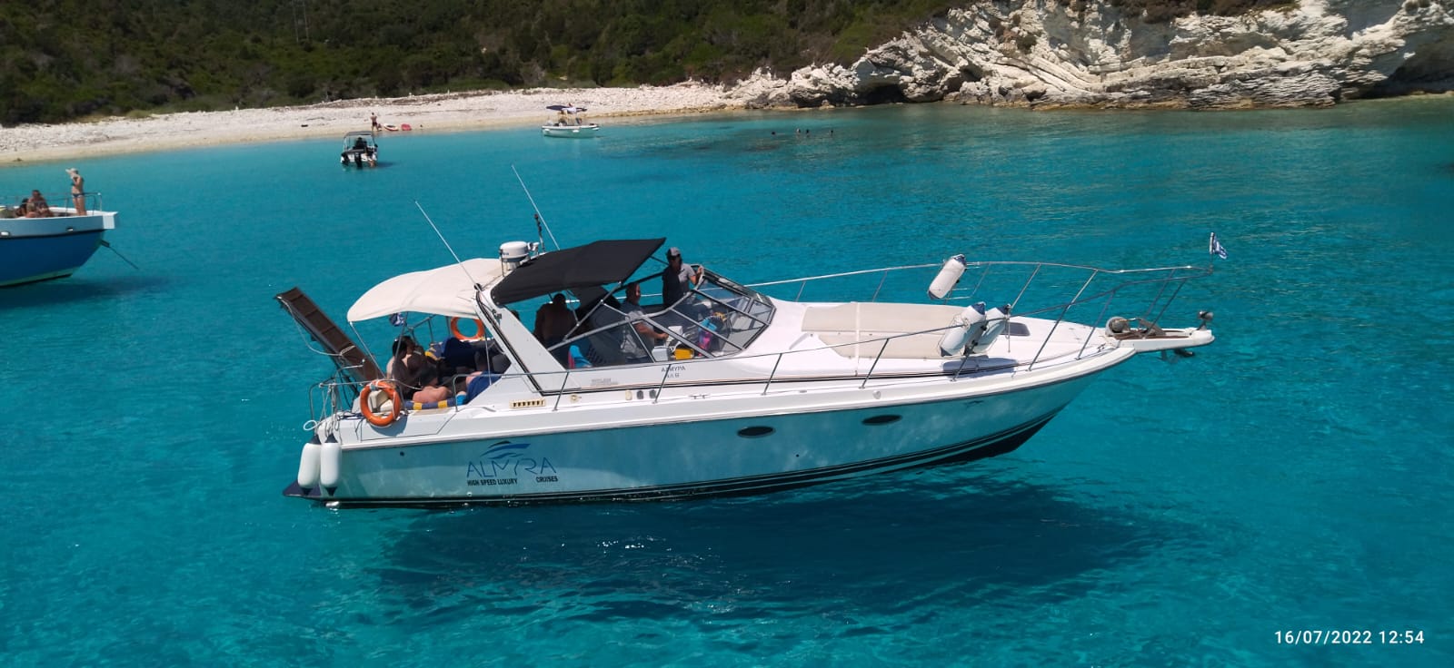 Yacht in the turquoise water near Sivota
