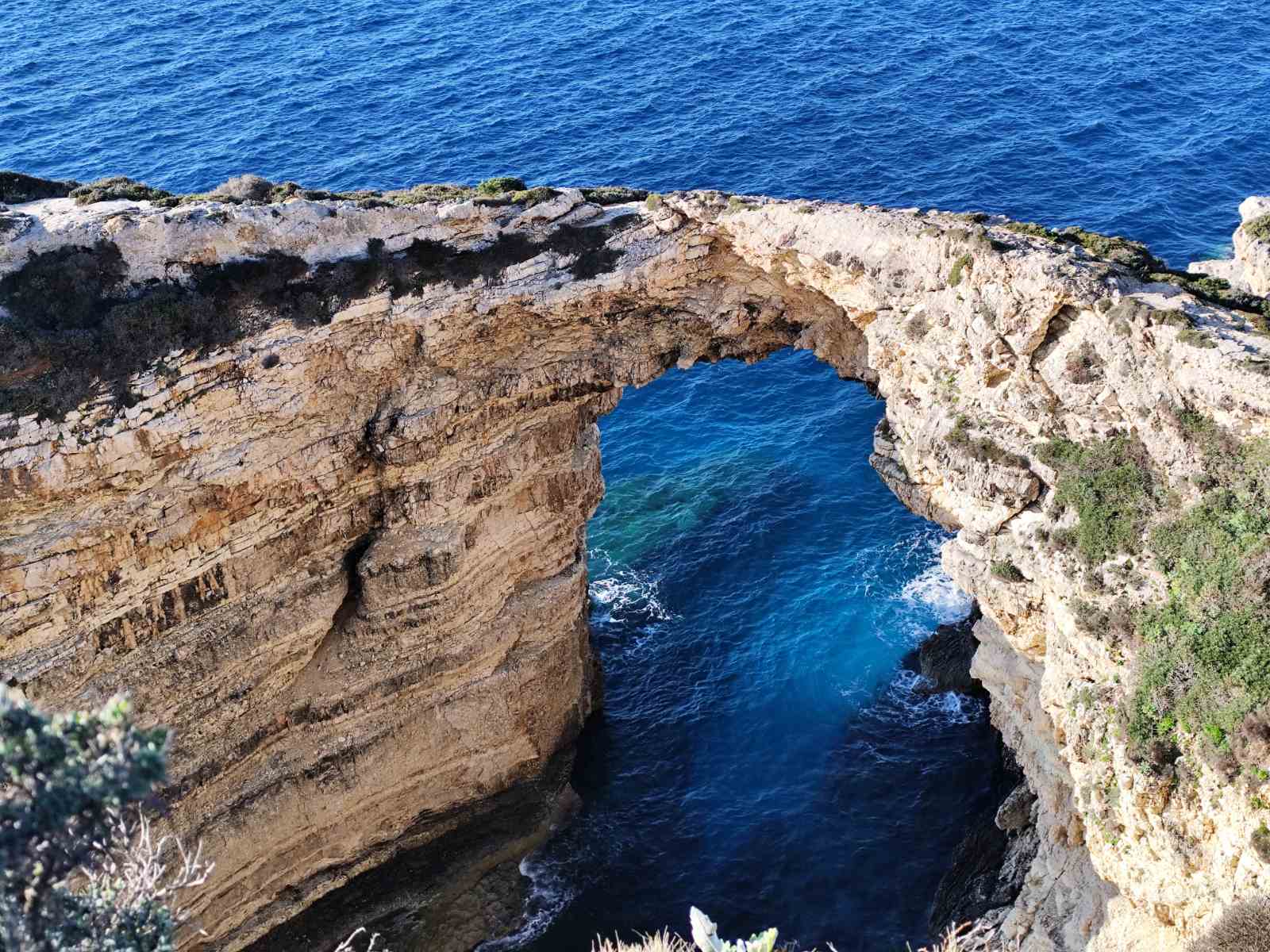 Natural sea arch and cave scenery near the Ionian coast